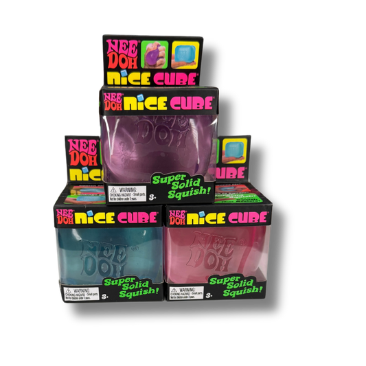 Four boxed Nee Doh Nice Cube squishy toys arranged in a pyramid stack on a white background. The packages show different colors: purple, blue, pink, and a darker purple, with colorful branding and text including 'Nee Doh Nice Cube' and 'Super Solid Squishy!'.