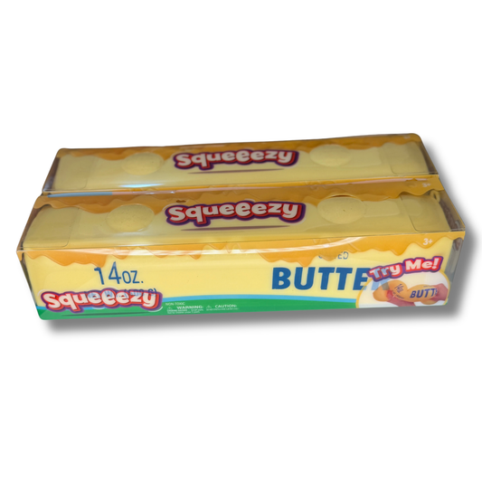 Two 14 oz packages of Squeezy Butter Try Me! candy, stacked on a white background.