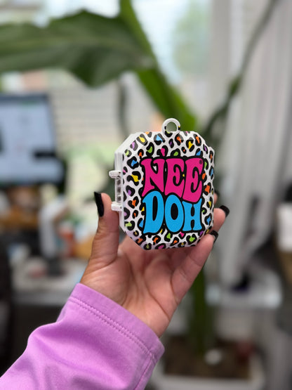White clipped-corner case with rainbow leopard print, a hanging loop, and pink and blue NeeDoh lettering